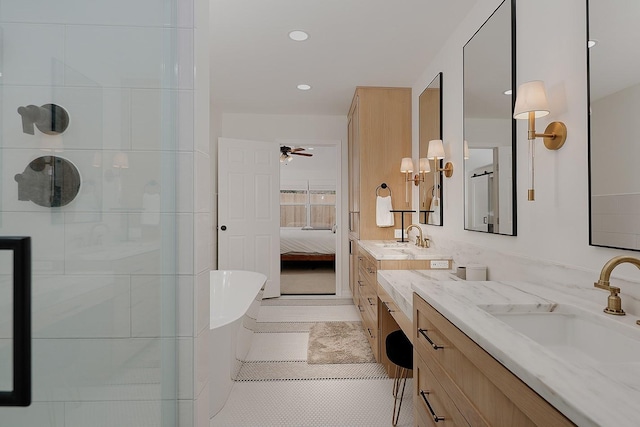 bathroom featuring ceiling fan, vanity, plus walk in shower, and tile patterned floors