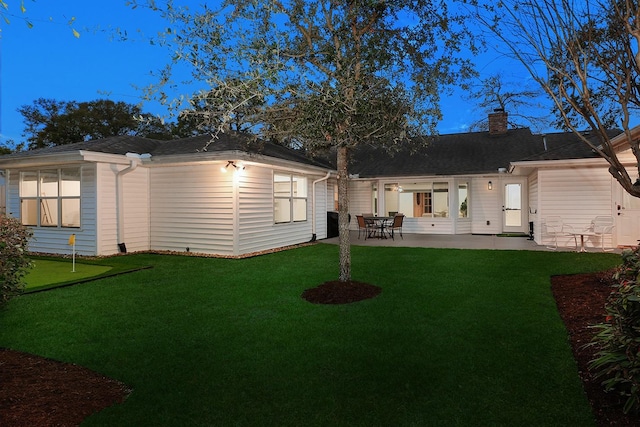 rear view of property with a patio area