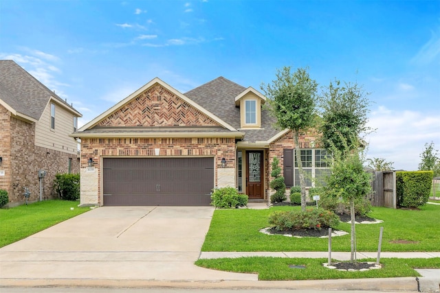 craftsman house with a front yard and a garage