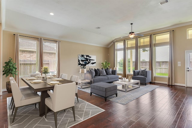 dining room with dark hardwood / wood-style flooring, ceiling fan, vaulted ceiling, and plenty of natural light