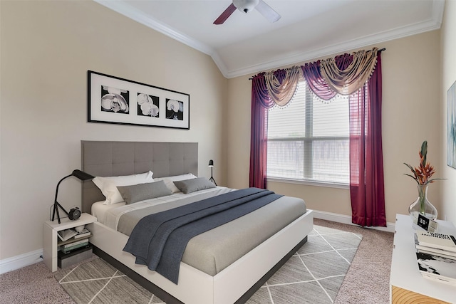 carpeted bedroom with multiple windows, ceiling fan, and ornamental molding