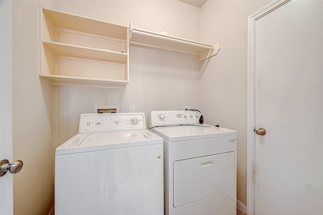 washroom with washer and clothes dryer