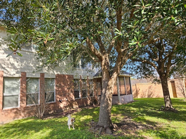 view of property exterior featuring a yard