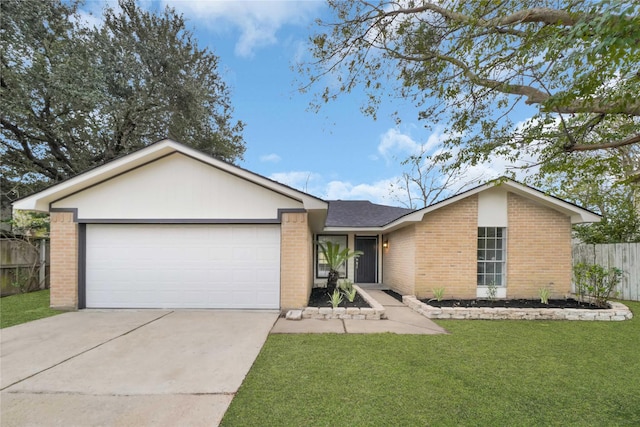 ranch-style house with a garage and a front lawn