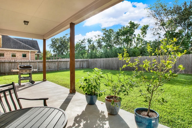 view of patio with a grill