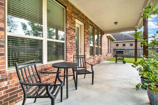 view of patio with a grill