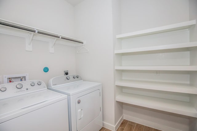 laundry room featuring washing machine and dryer