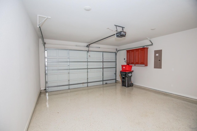 garage with electric panel and a garage door opener