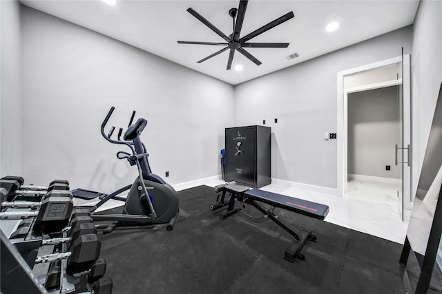 workout room featuring ceiling fan