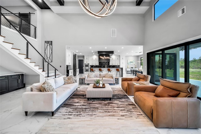 living room featuring a high ceiling