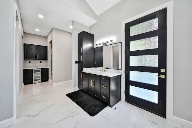 bathroom featuring vanity and wine cooler