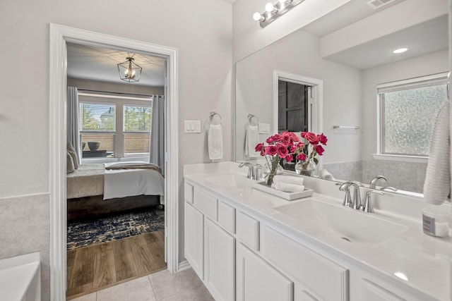 bathroom featuring vanity and tile patterned flooring