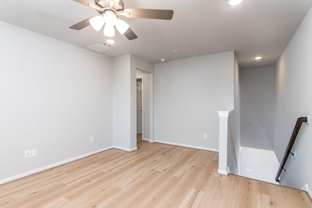 unfurnished room featuring light wood-type flooring and ceiling fan