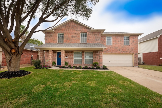 view of front facade featuring a garage and a front lawn