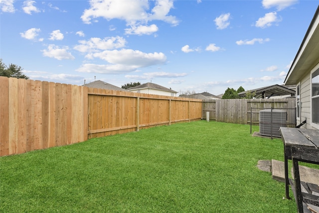 view of yard featuring central AC unit