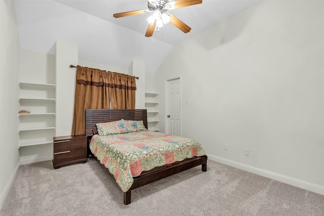 carpeted bedroom with ceiling fan and lofted ceiling