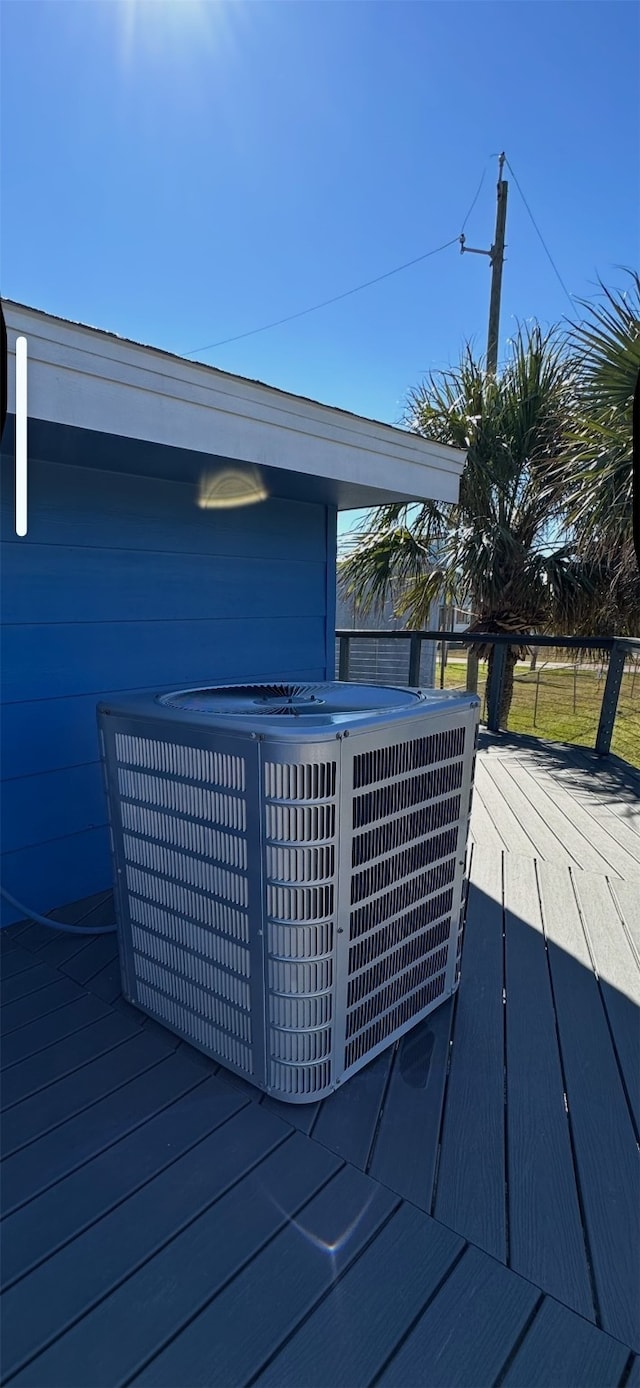 wooden terrace with central air condition unit