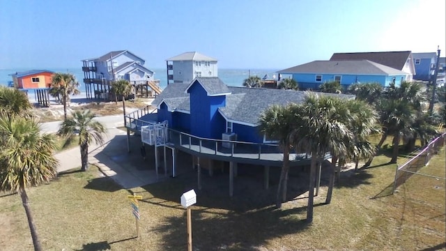 view of pool with a yard