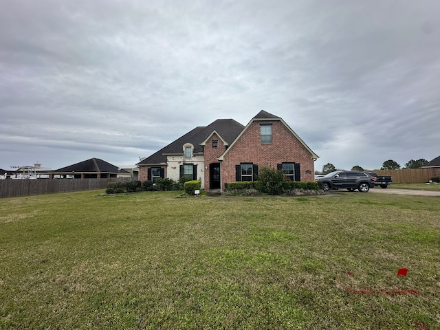 view of front of house featuring a front yard