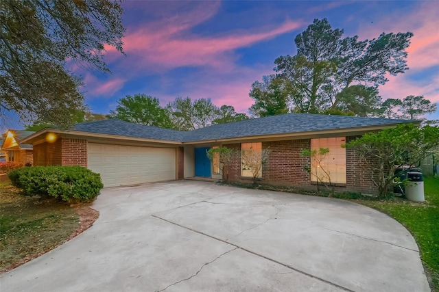 ranch-style home with a garage