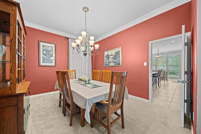 carpeted dining area with an inviting chandelier and ornamental molding