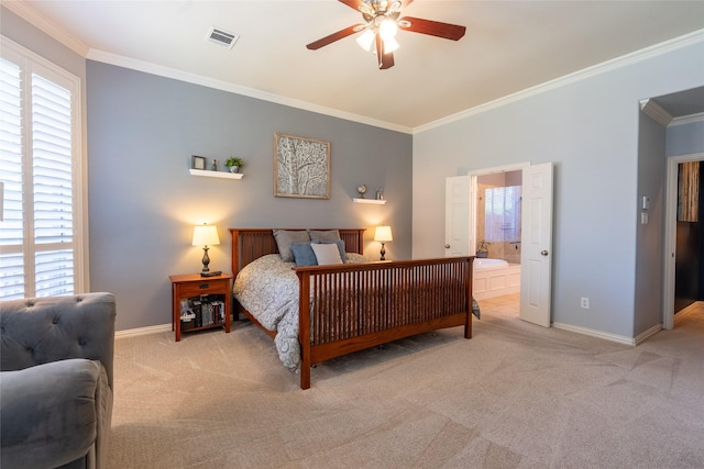 bedroom with ensuite bathroom, ceiling fan, crown molding, and light carpet