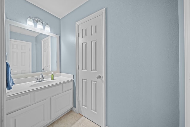 bathroom featuring tile patterned floors and vanity