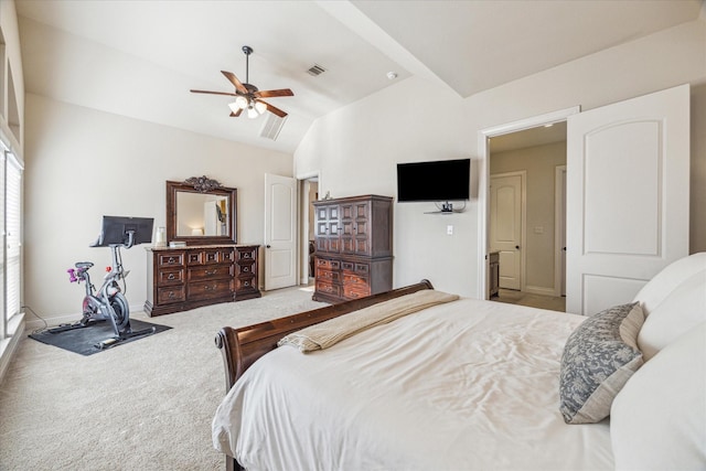 bedroom with ceiling fan, lofted ceiling, and carpet flooring