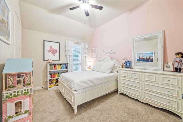 carpeted bedroom featuring ceiling fan and vaulted ceiling