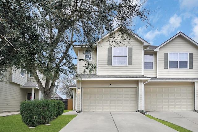 view of front of property with a garage