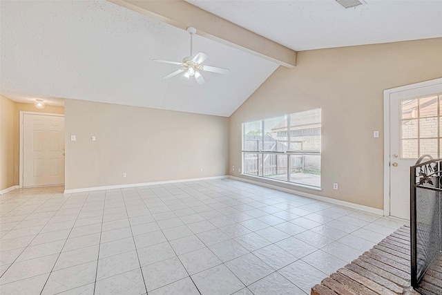 unfurnished living room with light tile patterned floors, a textured ceiling, lofted ceiling with beams, and ceiling fan