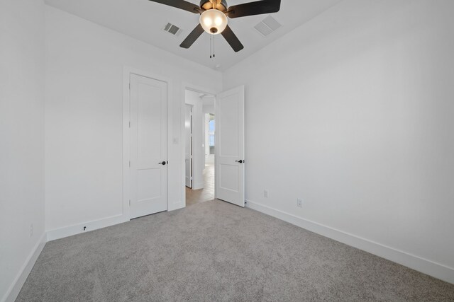 30551 Zoysia Point Ln, Fulshear, TX 77423 - empty room with carpet floors and a ceiling fan