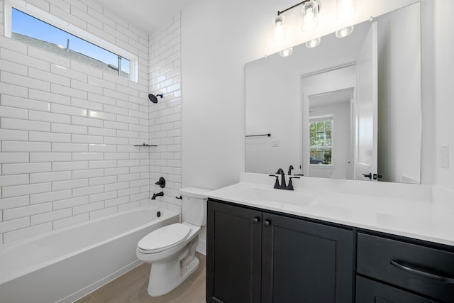 30551 Zoysia Point Ln, Fulshear, TX 77423 - bathroom featuring vanity, wood finished floors, and washtub / shower combination