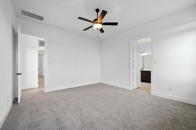 30551 Zoysia Point Ln, Fulshear, TX 77423 - unfurnished bedroom featuring carpet, ensuite bath, and ceiling fan