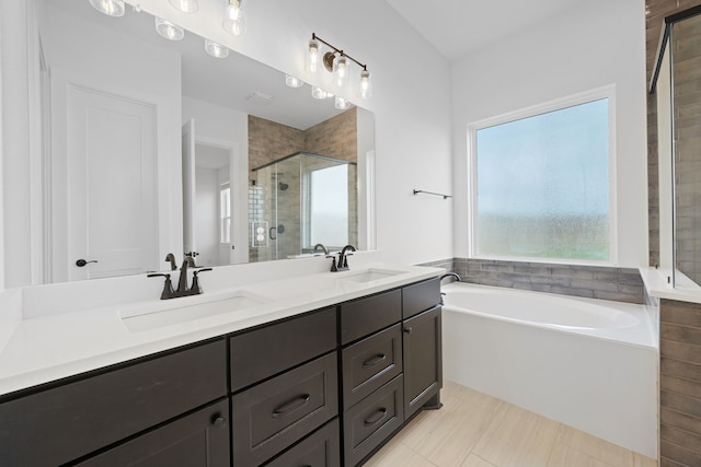 30551 Zoysia Point Ln, Fulshear, TX 77423 - full bathroom featuring a stall shower, a garden tub, and double vanity