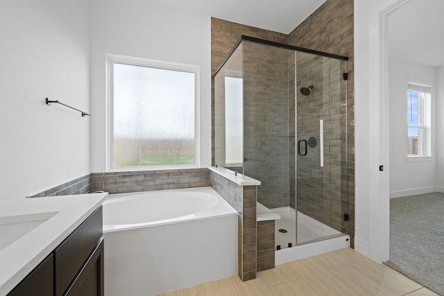 30551 Zoysia Point Ln, Fulshear, TX 77423 - full bathroom with a bath, a shower stall, vanity, and tile patterned flooring