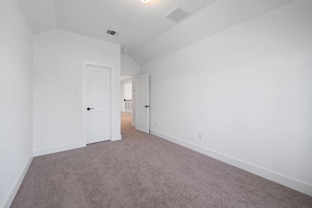 30551 Zoysia Point Ln, Fulshear, TX 77423 - unfurnished bedroom with lofted ceiling and carpet floors