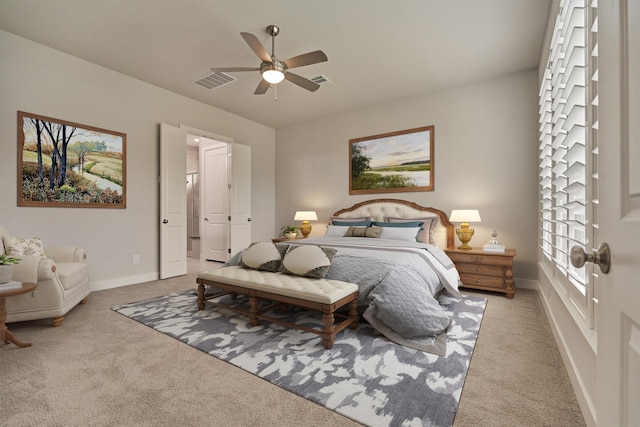 bedroom with ceiling fan and carpet