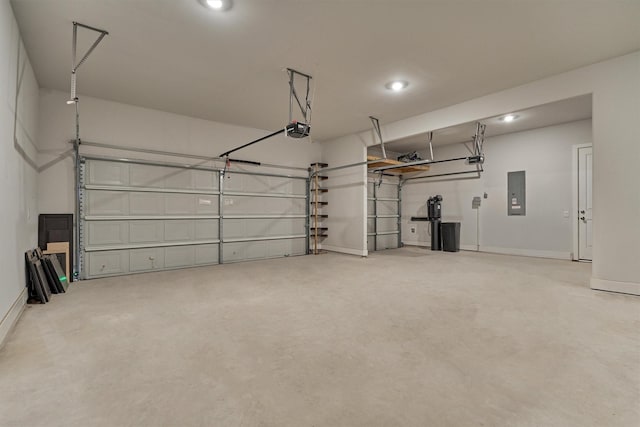 garage featuring a garage door opener and electric panel