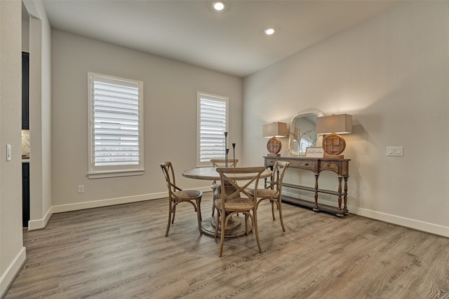 dining room with light hardwood / wood-style floors