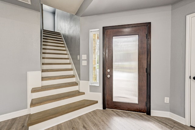 entrance foyer with hardwood / wood-style floors