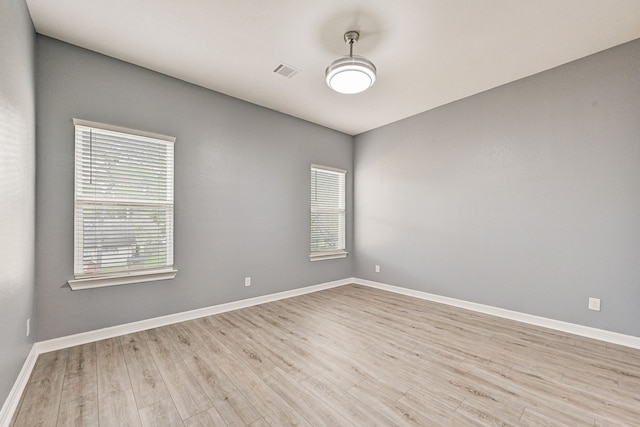 empty room featuring light hardwood / wood-style floors