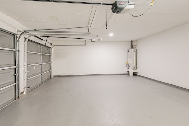 garage featuring a garage door opener and water heater