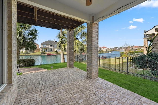 view of patio / terrace featuring a water view