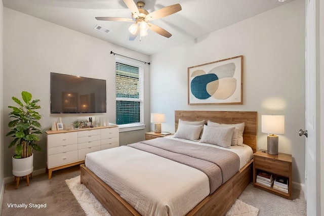 bedroom with ceiling fan and carpet flooring