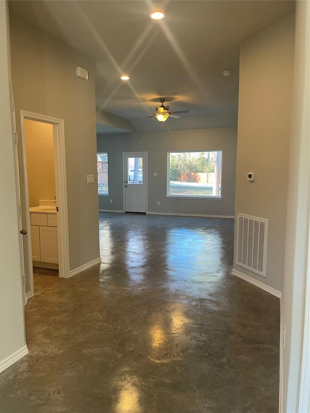 unfurnished room featuring ceiling fan