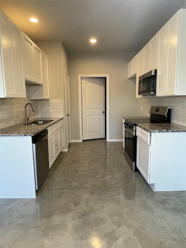 kitchen featuring stainless steel appliances, white cabinets, and sink