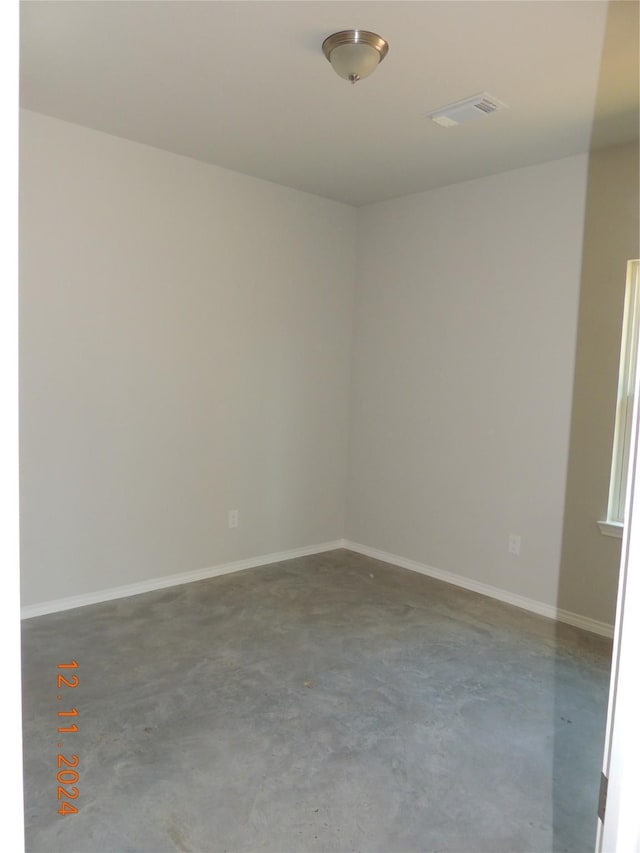 empty room featuring concrete floors