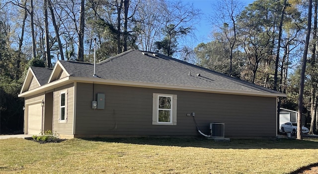 view of property exterior featuring central air condition unit and a lawn