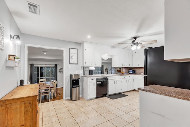 kitchen featuring light tile patterned floors, white cabinets, ceiling fan, and black appliances